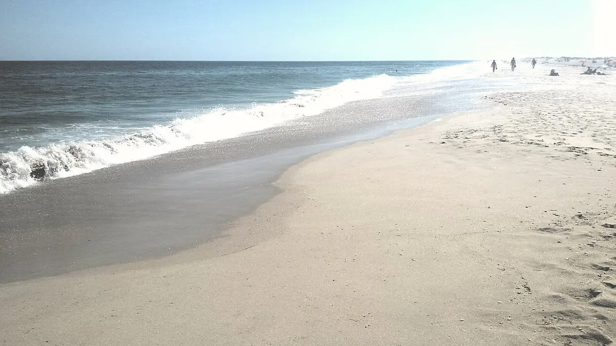 The broad sandy beach at Barril on Tavira island
