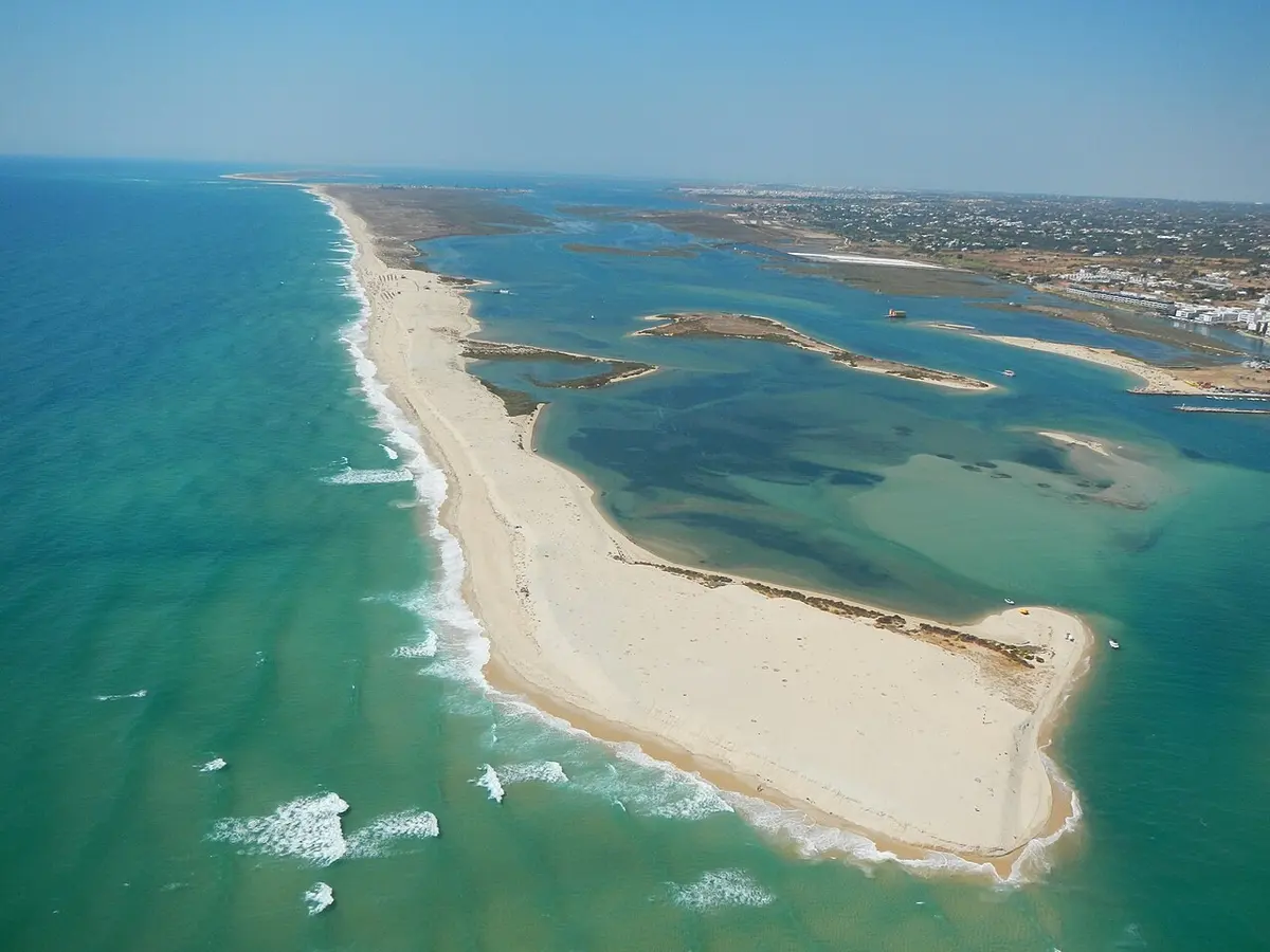 Aerial view of the barrier-island beach and lagoon opposite Fuseta