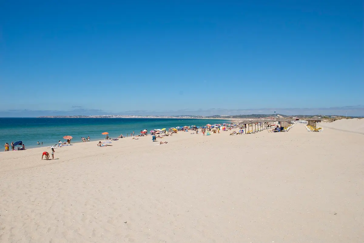 The beach and coastal setting at Praia de Alvor in the western Algarve