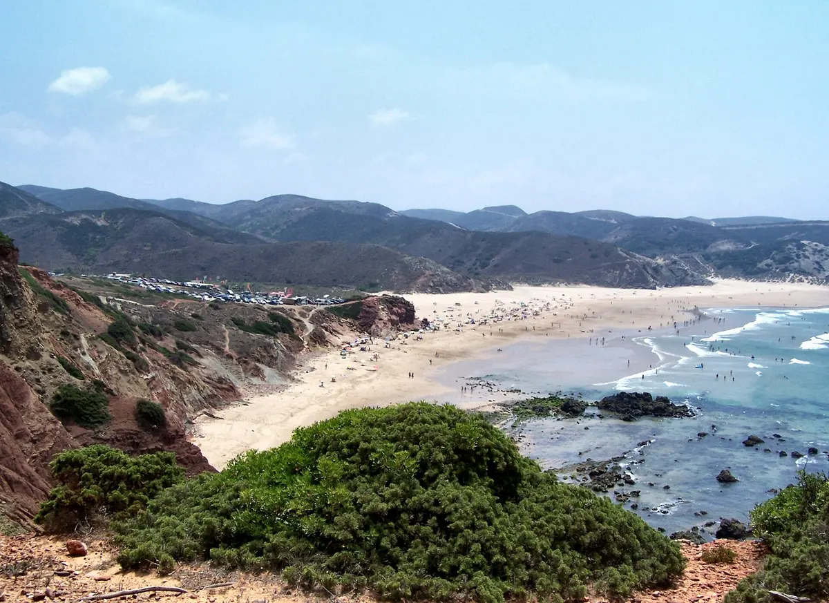 The beach and coastal setting at Praia do Amado in the western Algarve