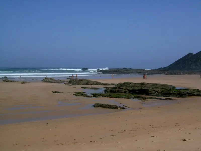 The beach and coastal setting at Praia da Amoreira in the western Algarve