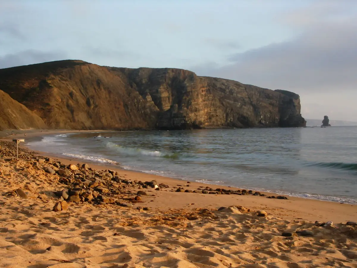 The beach and coastal setting at Praia da Arrifana in the western Algarve