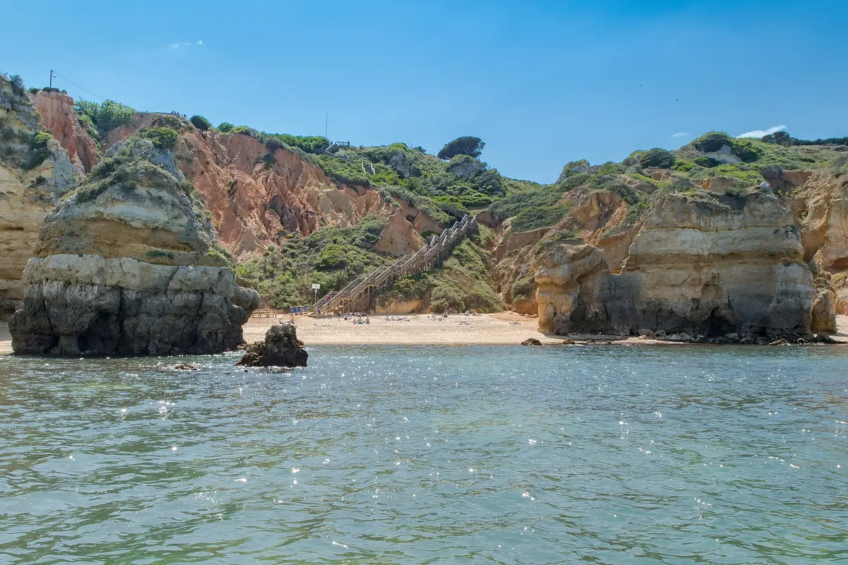 The beach and coastal setting at Praia do Camilo in the western Algarve