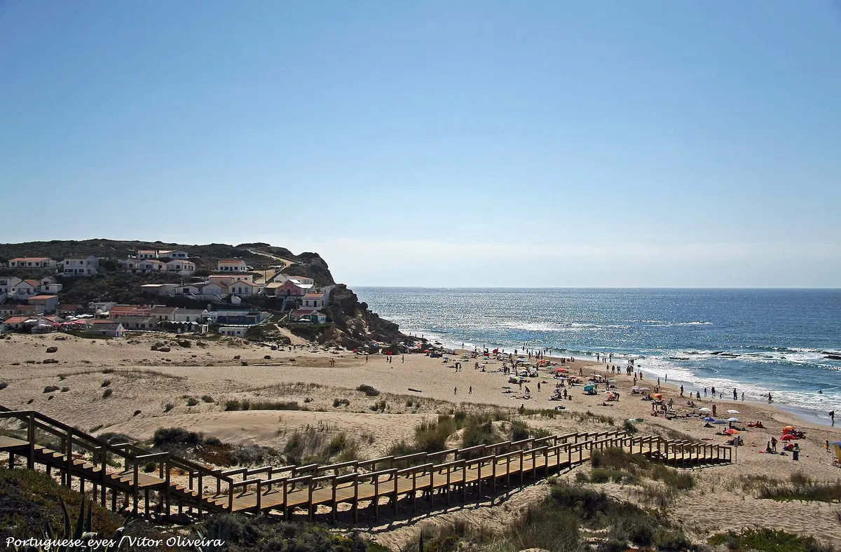 The beach and coastal setting at Praia do Monte Clérigo in the western Algarve