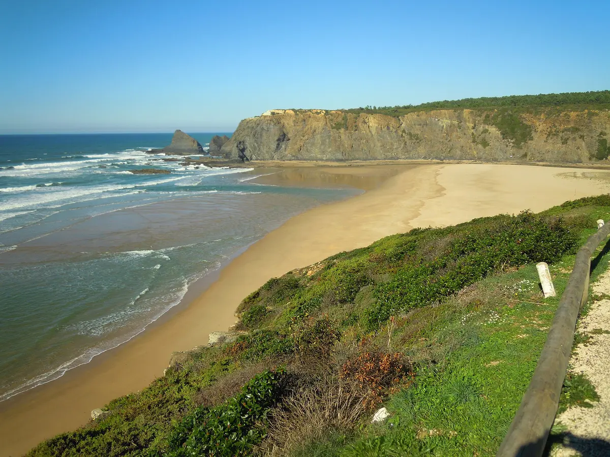 The beach and coastal setting at Praia de Odeceixe in the western Algarve