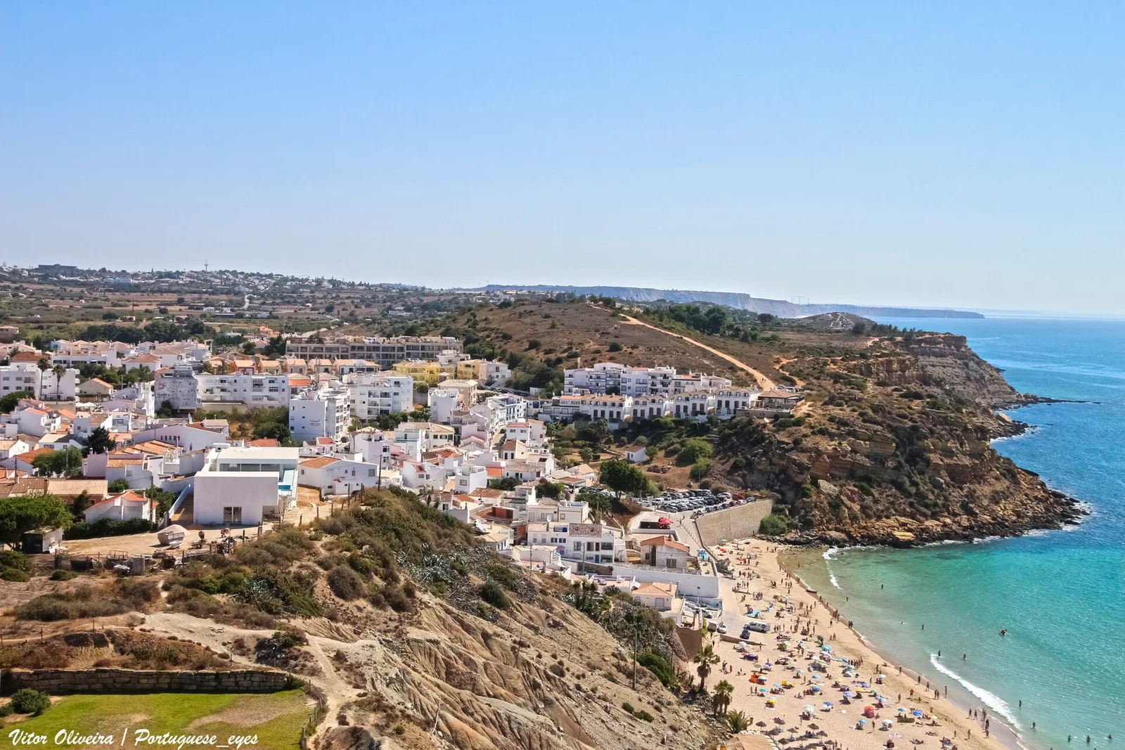 Burgau village above its sandy cove and blue Atlantic water