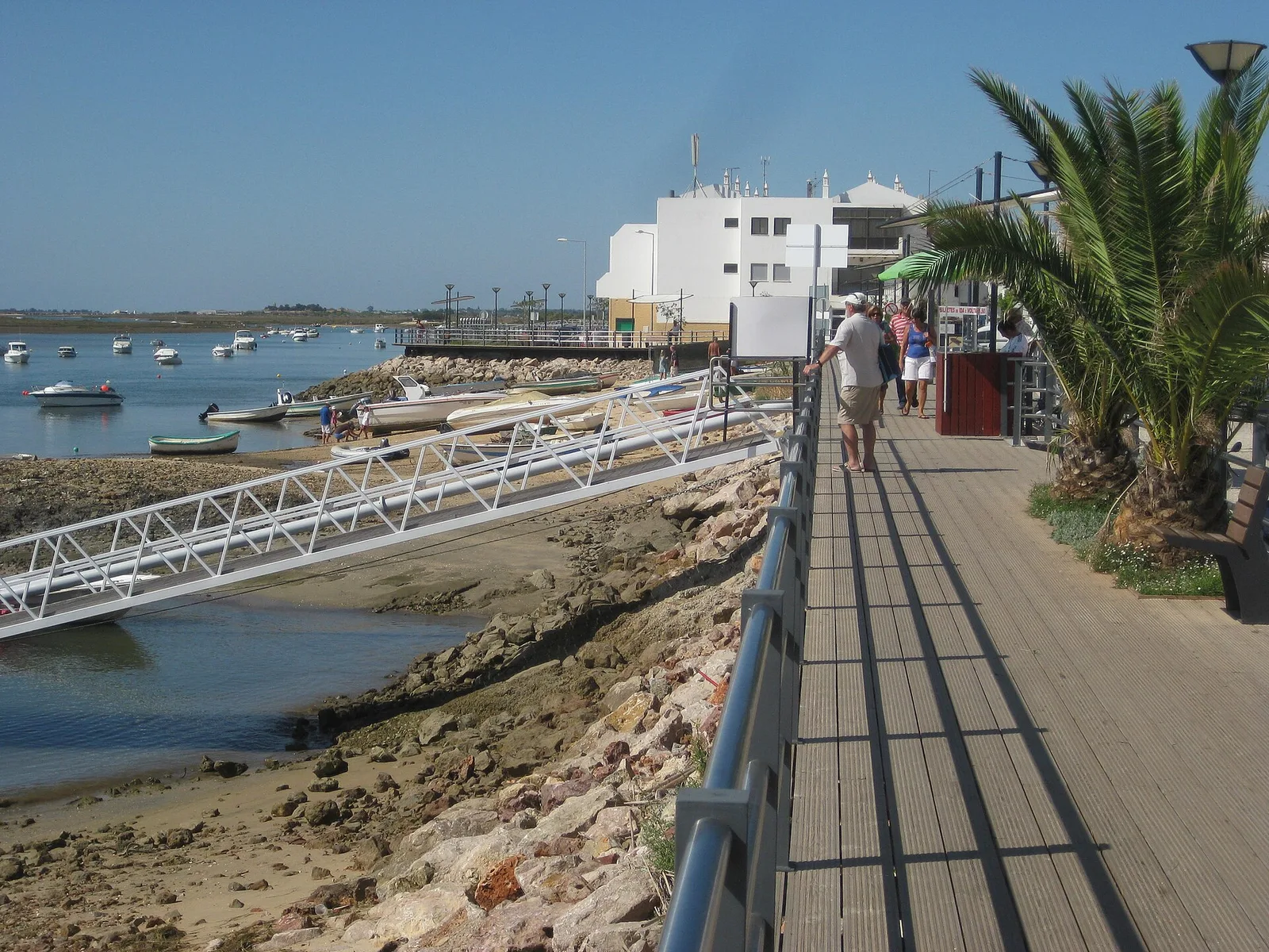 The waterfront boardwalk and boats at Cabanas de Tavira