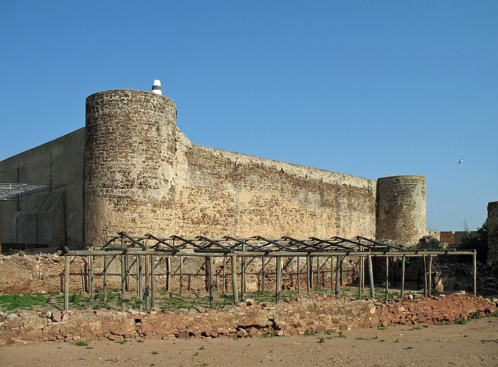 Stone walls and a round tower at Castro Marim castle