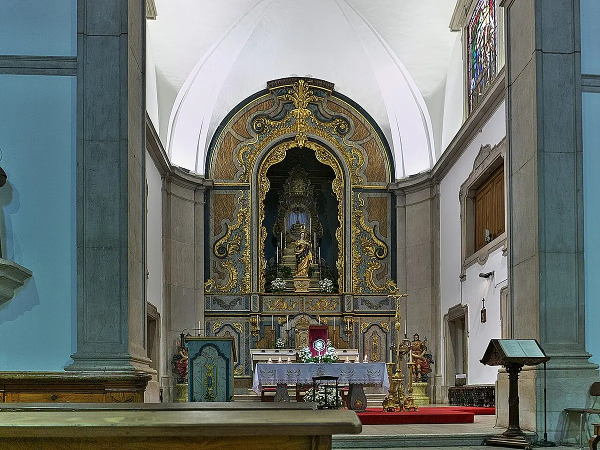 Main altar and painted interior of the parish church in Vila Real de Santo António