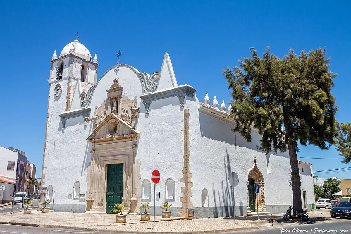 Parish church with decorated portal and bell tower in Luz de Tavira