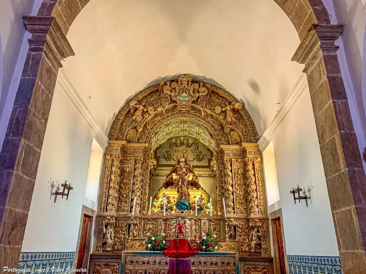 The ornate carved sanctuary and arch inside Monchique’s main church