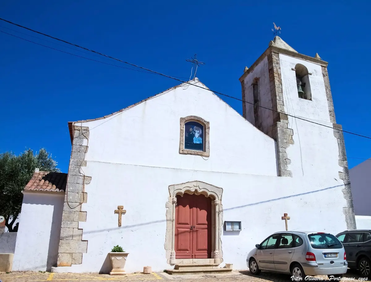 The parish church of Raposeira with its carved stone doorway and bell tower