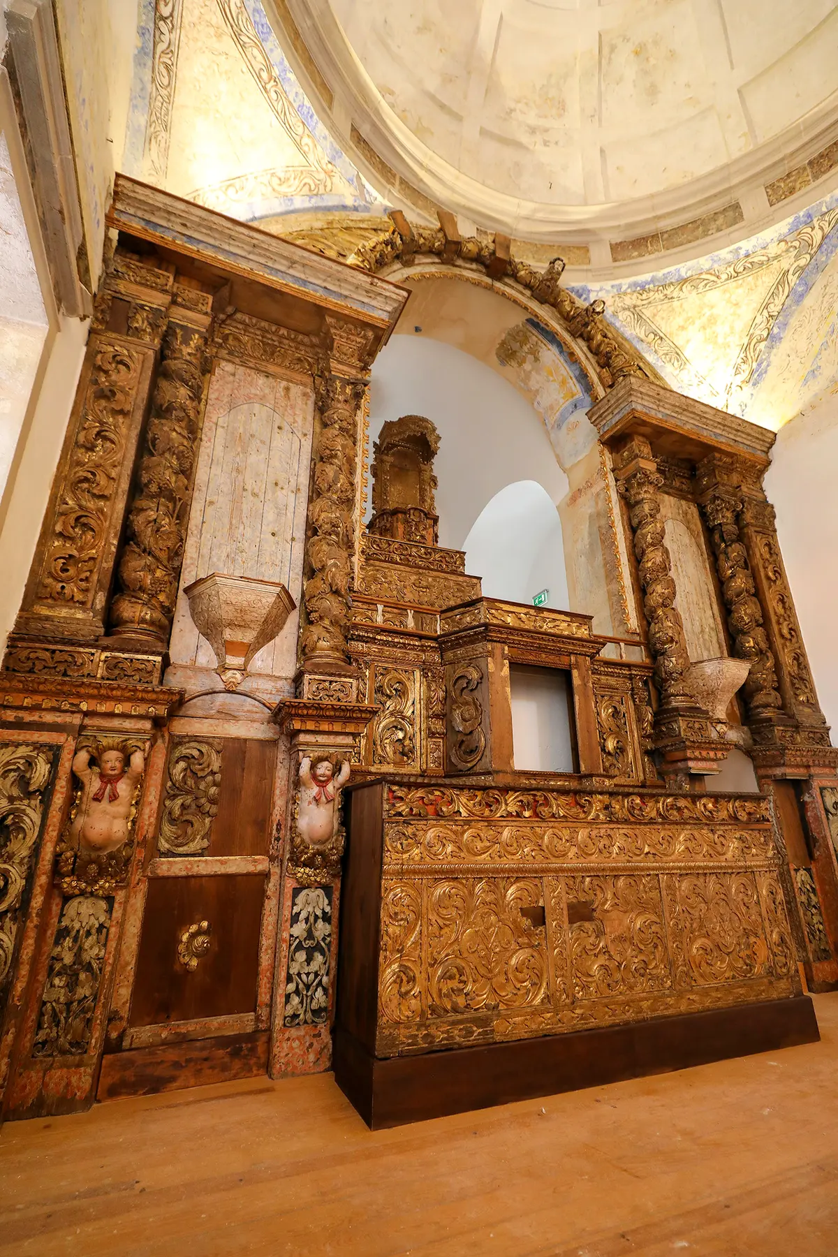 The restored gilded sanctuary and decorated arch of Nossa Senhora do Carmo church in Lagos