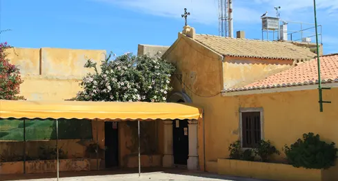 The ochre chapel building inside Santa Catarina fortress above Praia da Rocha