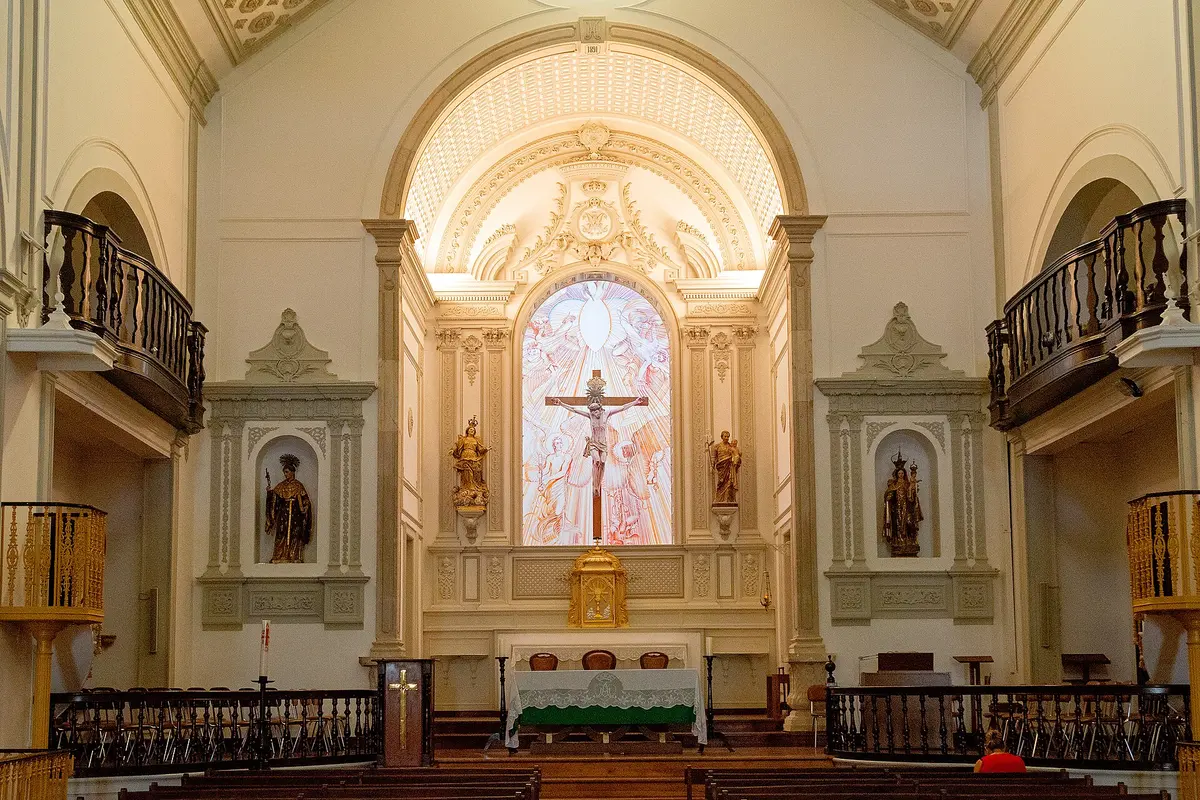 The nave and decorated sanctuary of Santa Maria church in Lagos