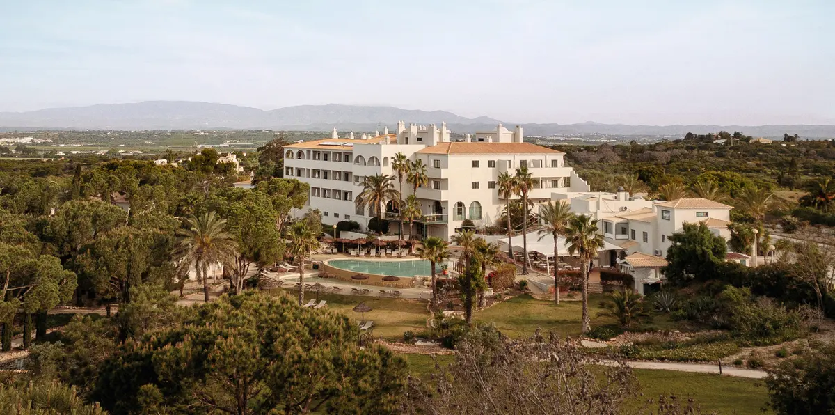 The main hotel building at Vale d’El Rei beyond landscaped grounds