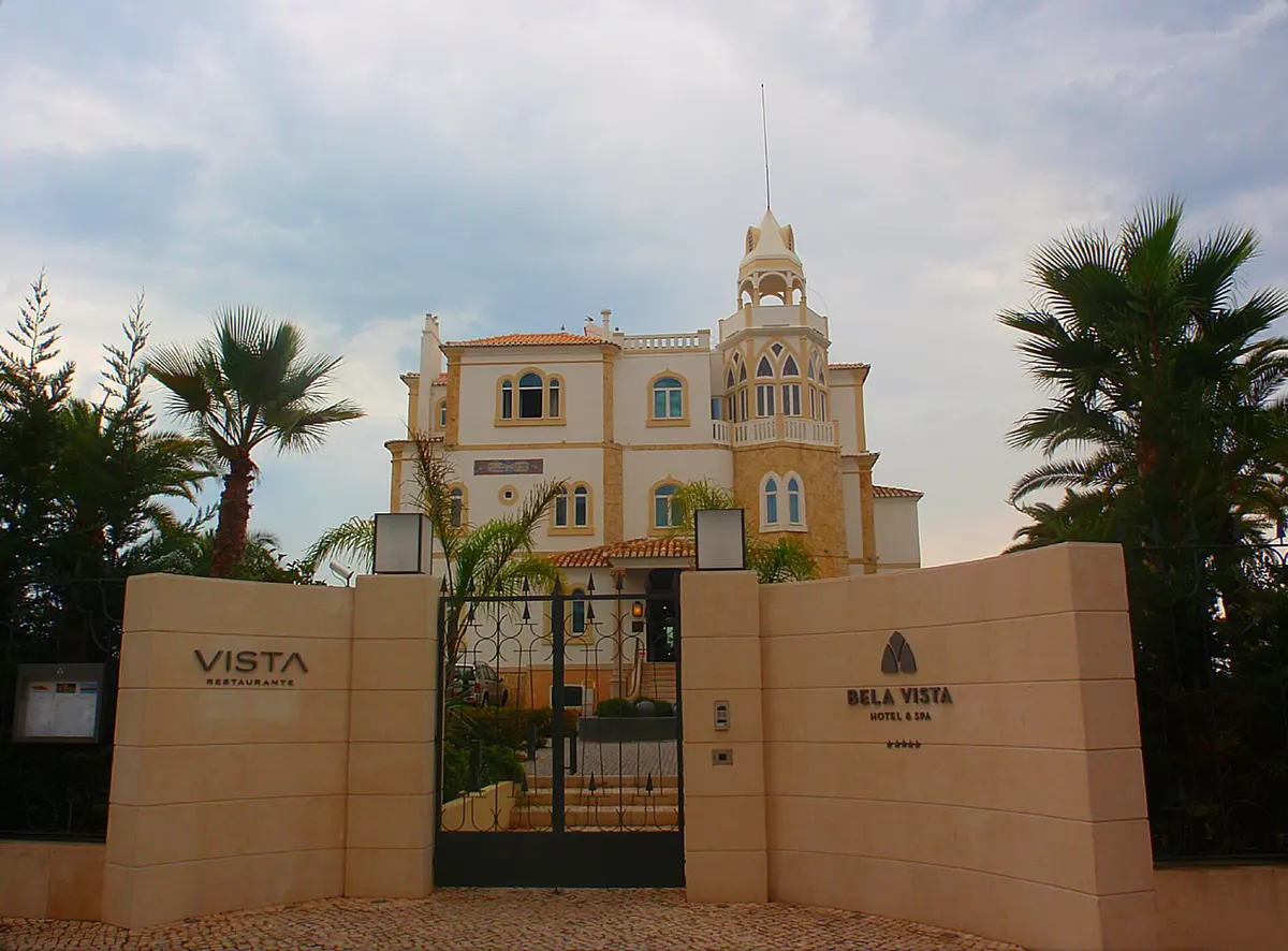 The historic villa façade and tower of Bela Vista Hotel & Spa in Praia da Rocha