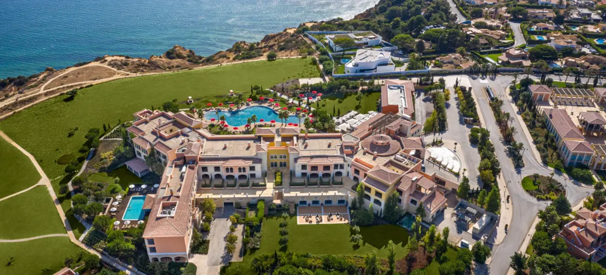 An aerial view of the Domes Cascade hotel buildings, pools and grounds near Ponta da Piedade