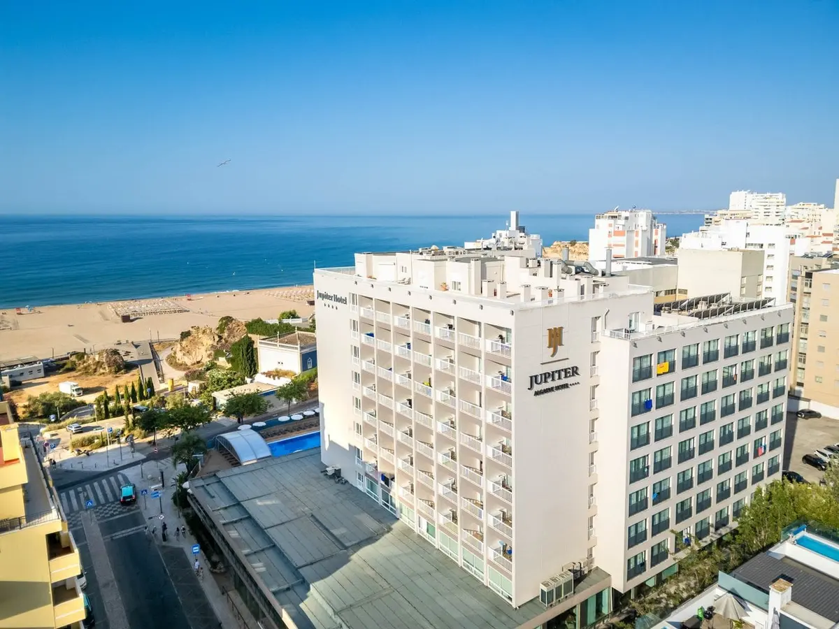 An elevated view of Jupiter Algarve Hotel with Praia da Rocha and the sea behind