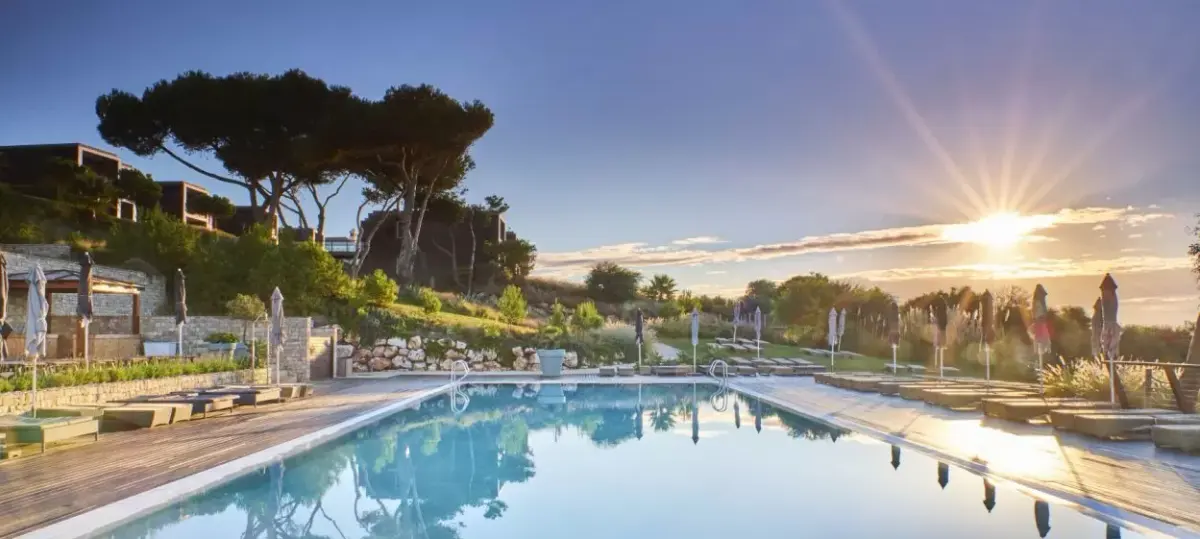The resort pool at Martinhal Sagres with gardens and poolside terraces