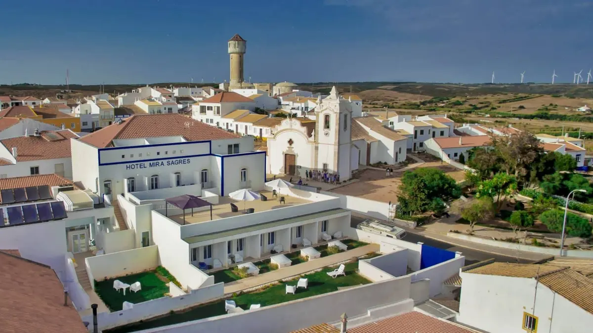 An aerial view of Hotel Mira Sagres in front of Vila do Bispo’s parish church