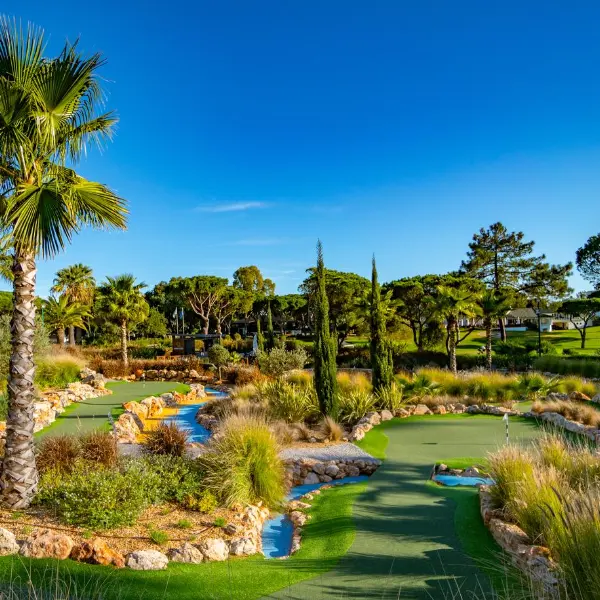 Landscaped mini-golf greens and water features at Quinta do Lago