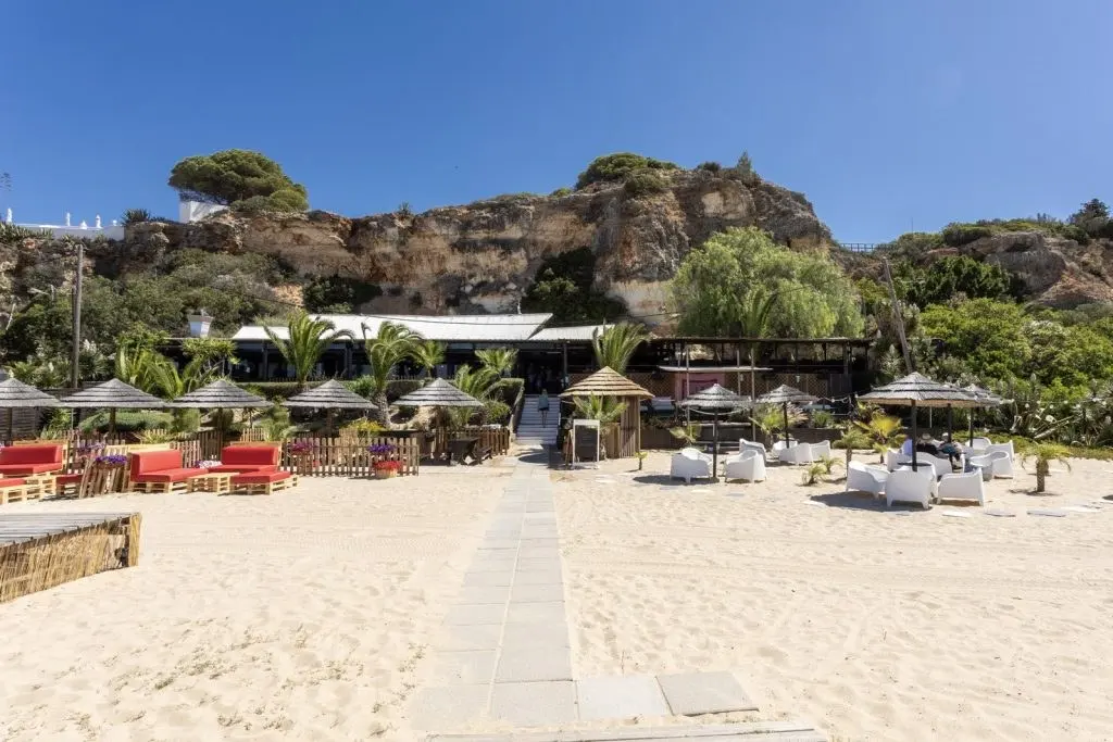 Club Nau’s beach seating on Praia Grande in Ferragudo