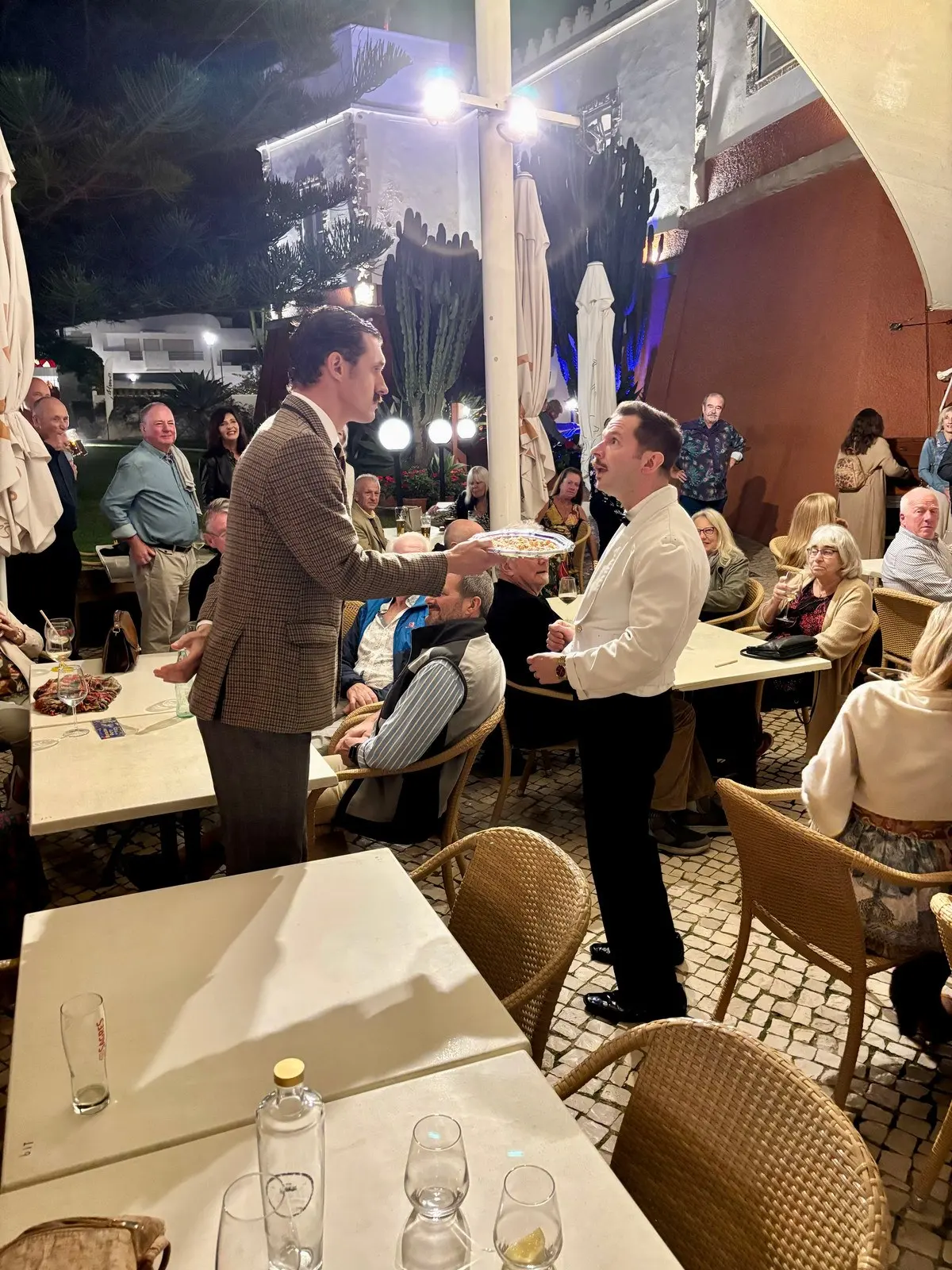 Diners and performers during an organised dining event inside Fortaleza da Luz