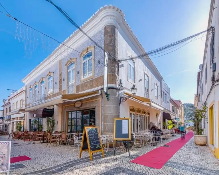 Mosaiko’s corner building and outdoor tables in Silves