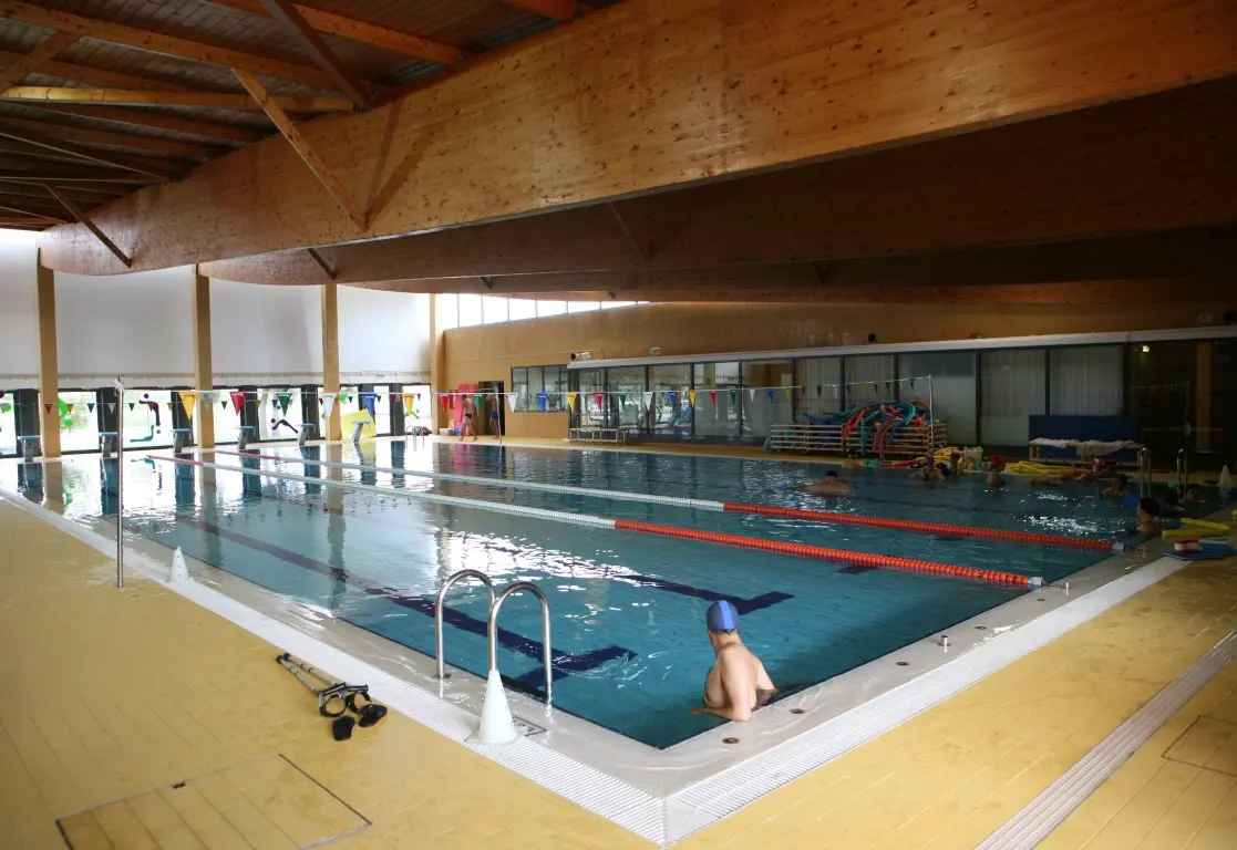 Timber roof and swimming lanes inside Alvor Municipal Sports Complex