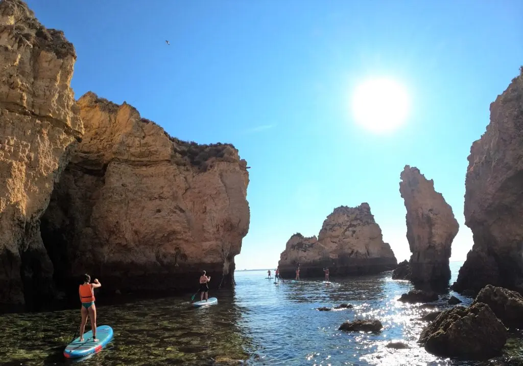 Paddleboarders among the limestone formations on Algarve Fun Sports’ Lagos SUP route