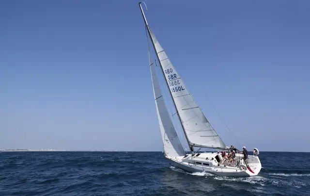 The yacht Firefly sailing with crew aboard in RU Sailing’s vessel gallery