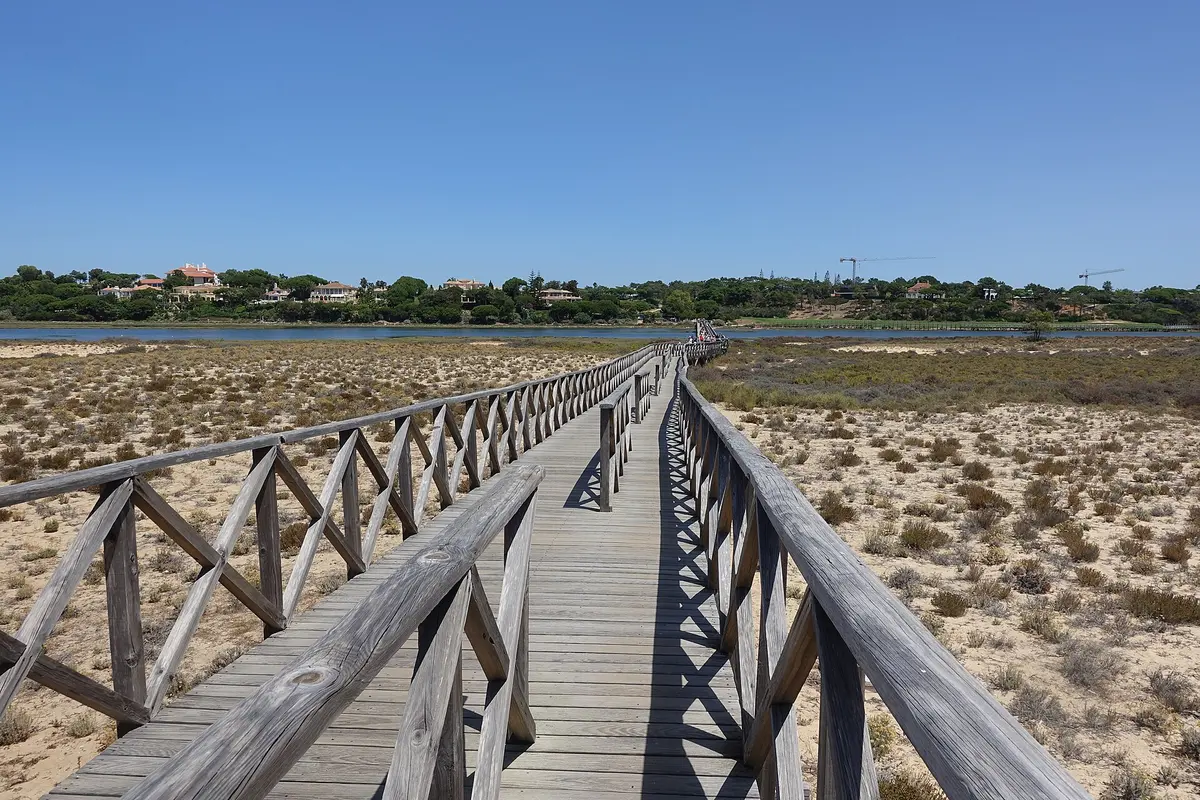 The wooden bridge connecting Quinta do Lago beach with the mainland