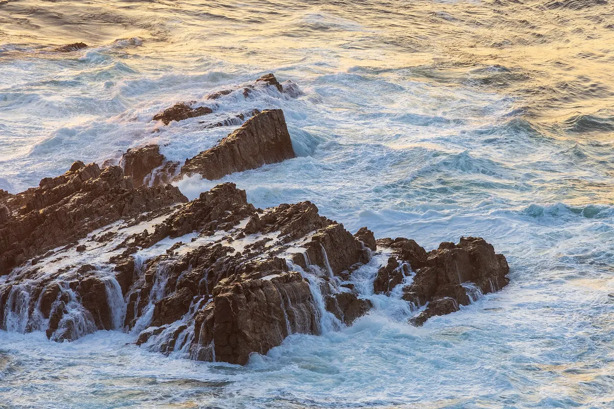 Atlantic waves around the rocks at Ponta da Atalaia near Vale da Telha